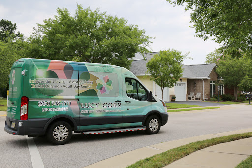 A colorful van parked on a street, showcasing its unique design and branding.