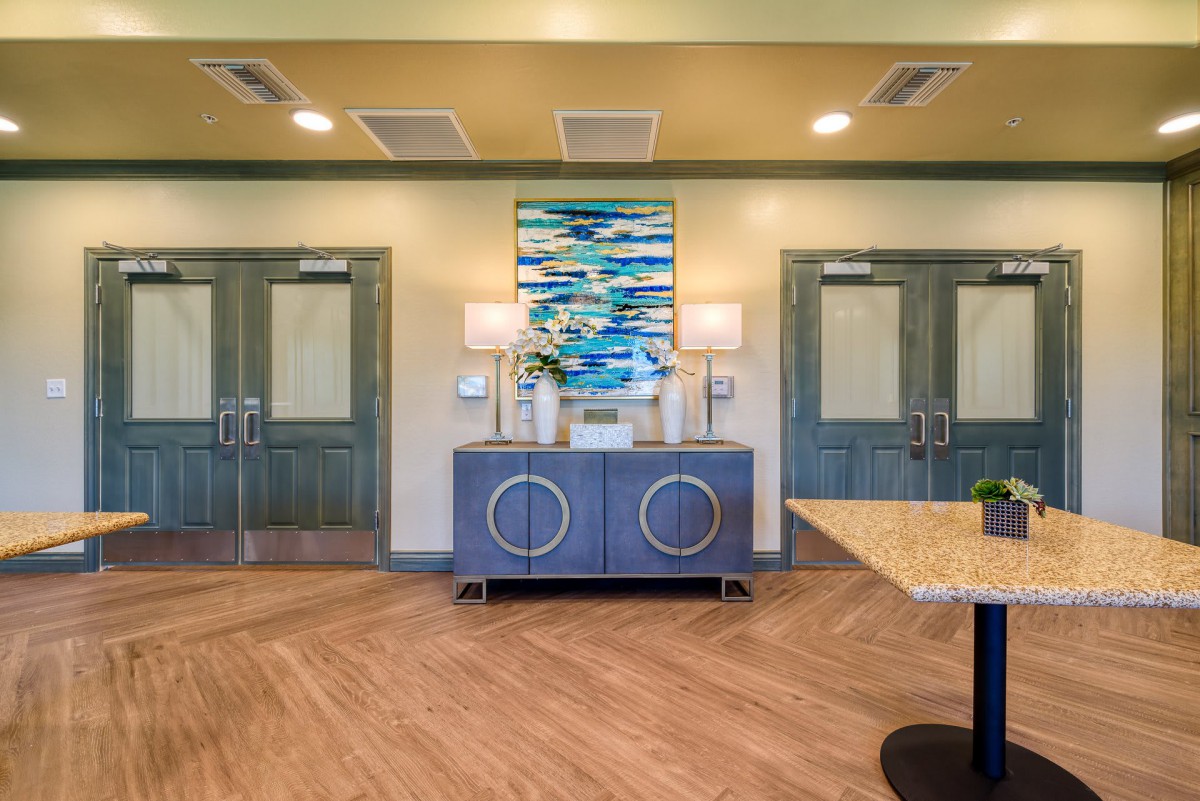 A modern lobby area with artwork and stylish decor.