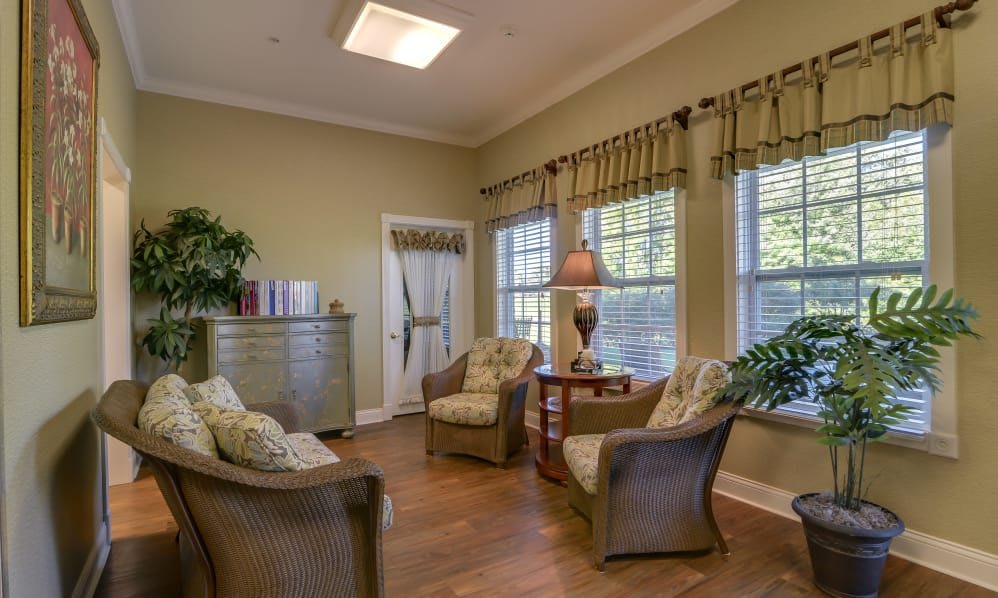 A cozy living room with comfortable seating and natural light.