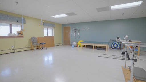 A well-equipped therapy room designed for rehabilitation and physical therapy.