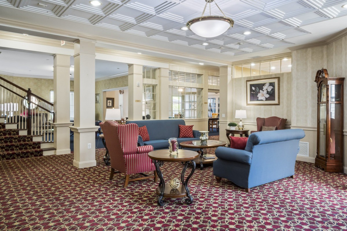 A well-decorated lobby with comfortable seating and elegant lighting.