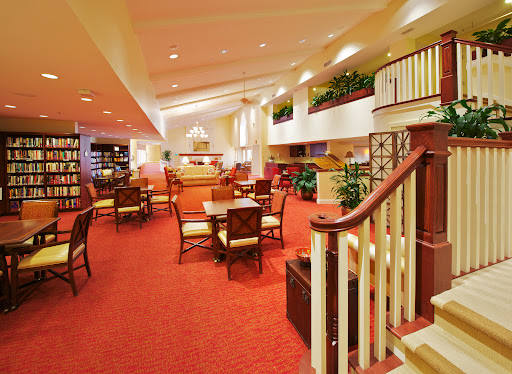 A spacious and inviting lobby area featuring comfortable seating, vibrant decor, and a welcoming atmosphere.
