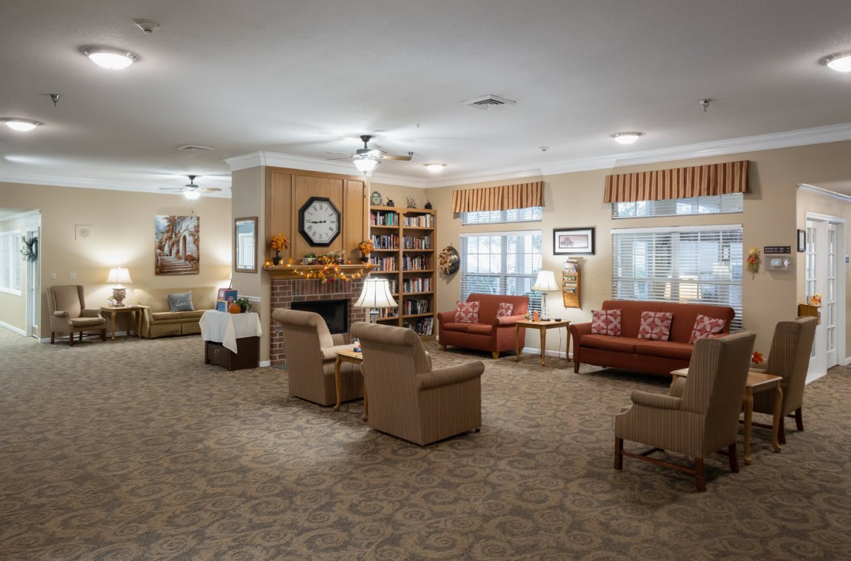 Cozy living room with comfortable seating and a fireplace.