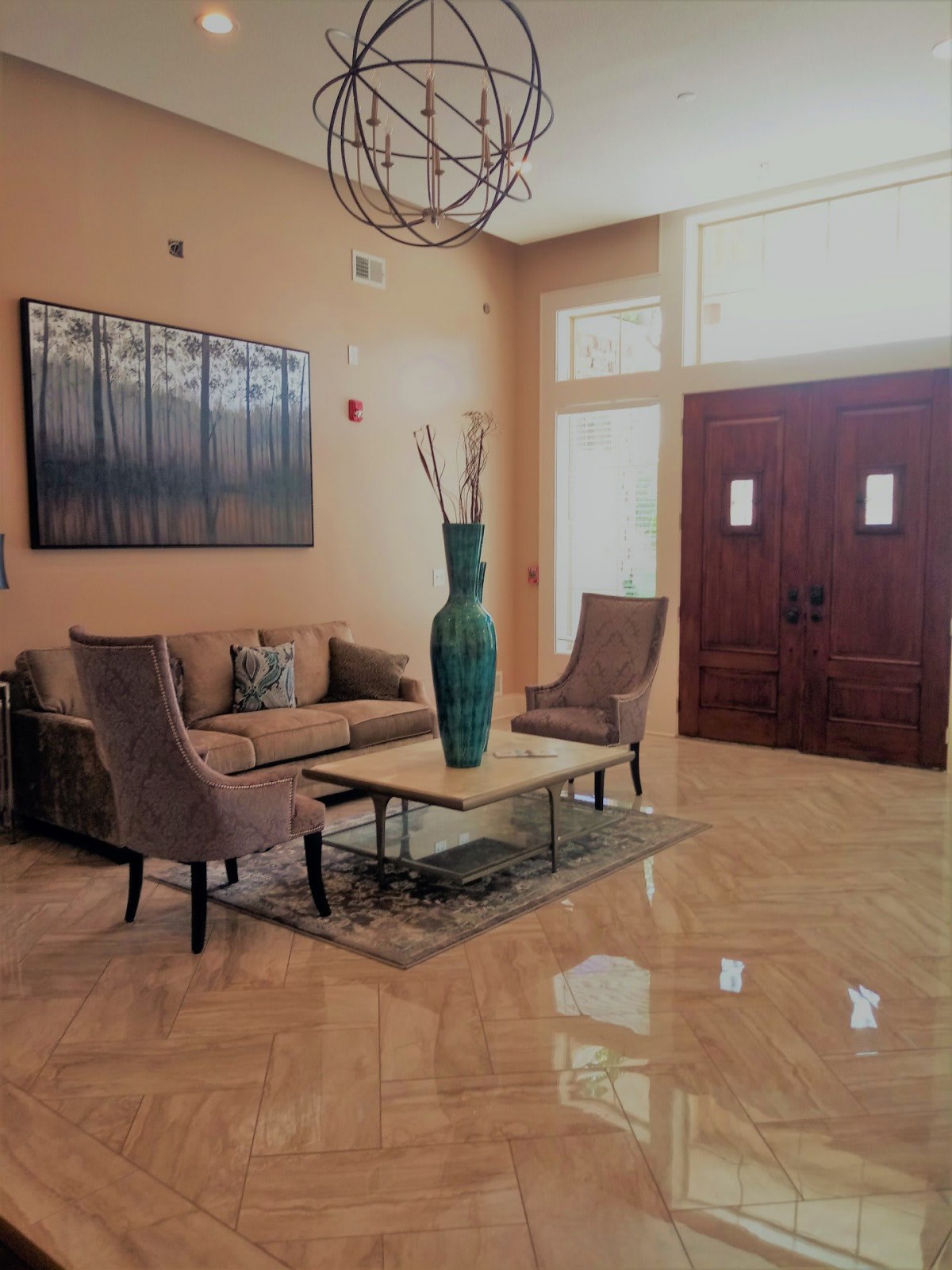 A stylish living room with modern furniture and elegant decor.
