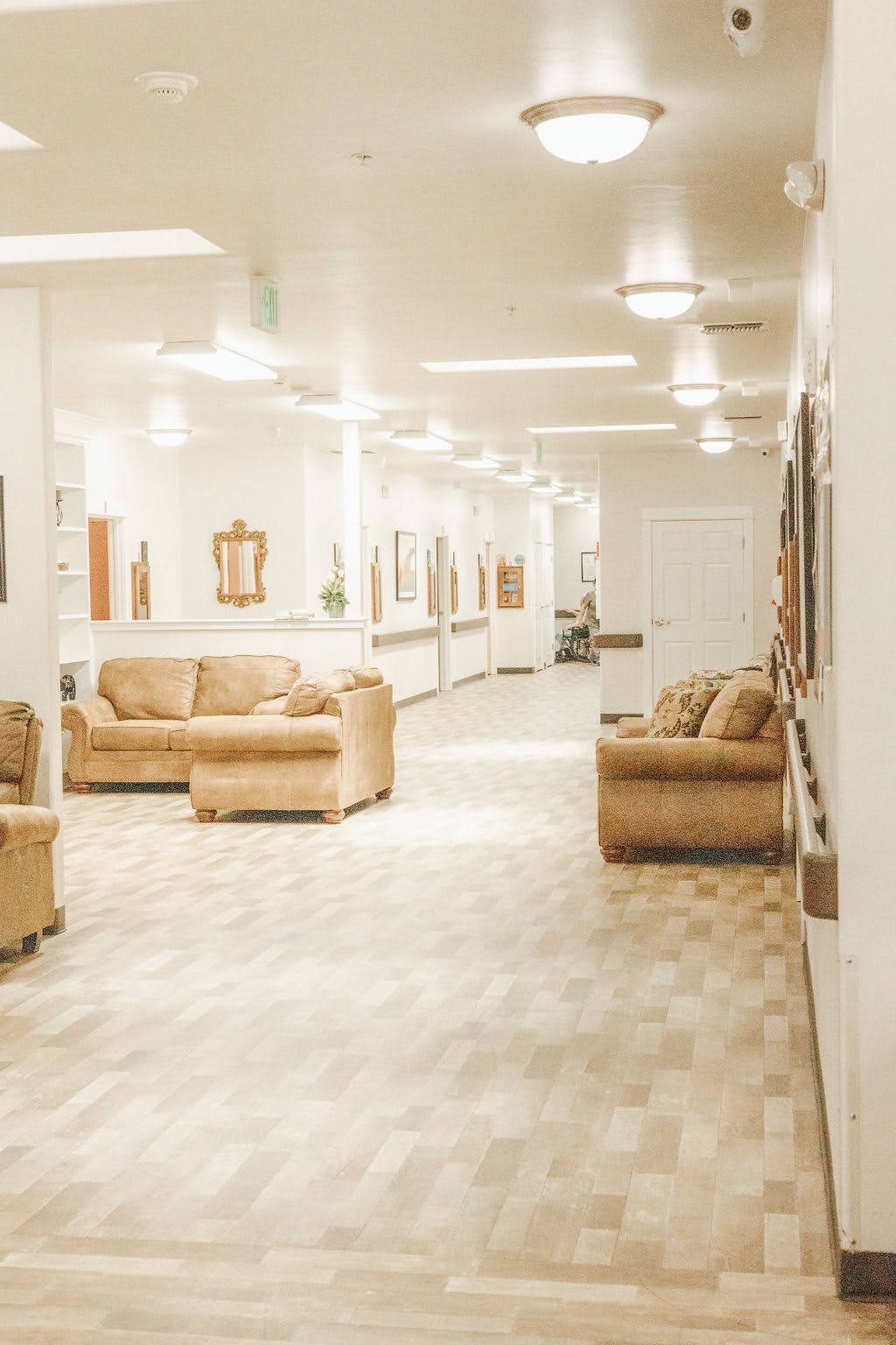 A spacious and well-lit waiting area with comfortable seating arrangements.