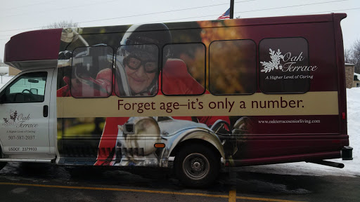 A bus featuring an advertisement with the slogan 'Forget ageit's only a number,' promoting a positive outlook on aging.