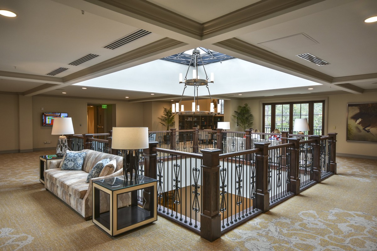 A cozy lobby interior with stylish furniture and natural lighting.