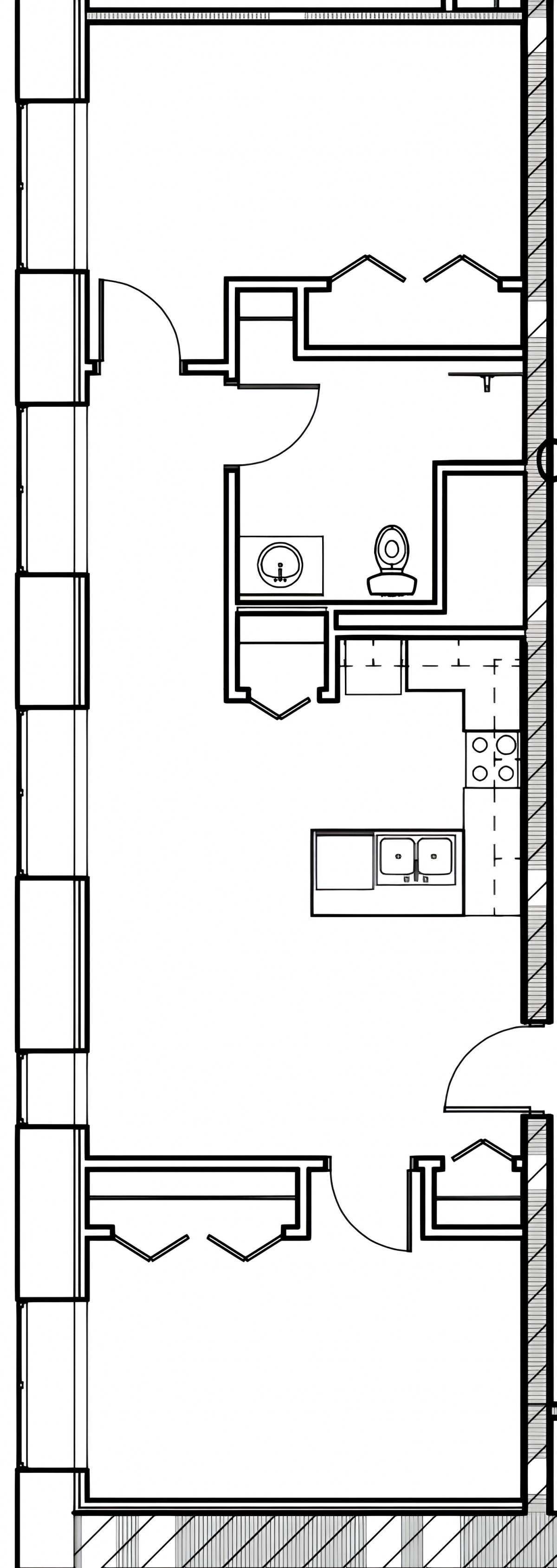 A floor plan showing a bathroom and a kitchen layout.