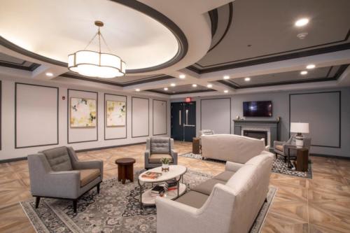 A modern lobby with comfortable seating and elegant lighting.
