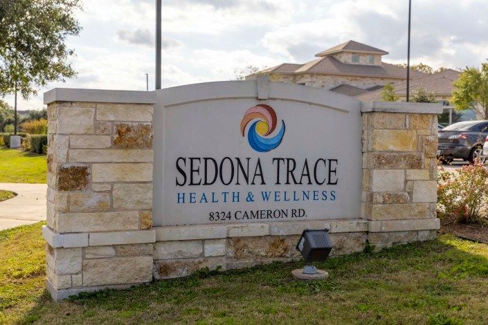 Sign for Sedona Trace Health & Wellness located at 8324 Cameron Rd.