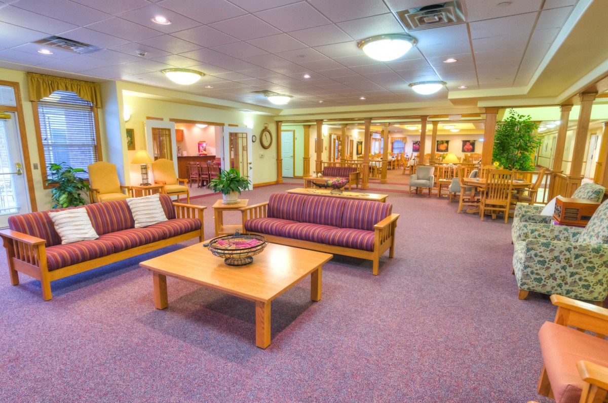 A spacious lobby with comfortable seating and bright lighting.