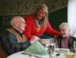 A joyful moment around the dining table with family.
