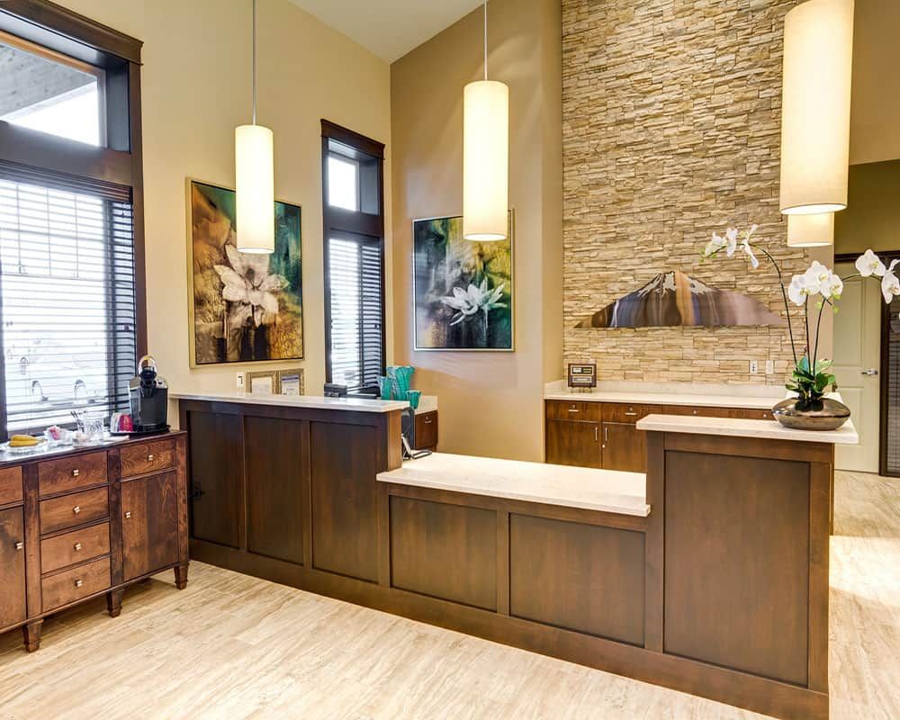 A modern reception area with warm lighting and stylish decor.