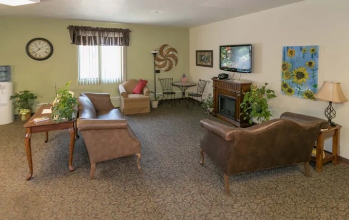 A cozy living room with comfortable seating and stylish decorations.