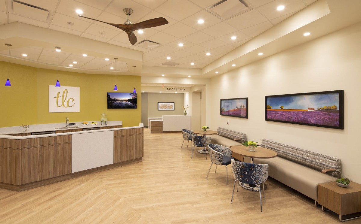 A modern office reception area with comfortable seating and stylish decor.