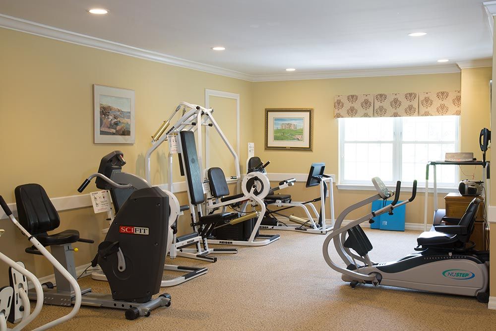 A home gym with various exercise equipment for fitness and workouts.