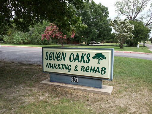 Sign for Seven Oaks Nursing & Rehab, indicating a healthcare facility.