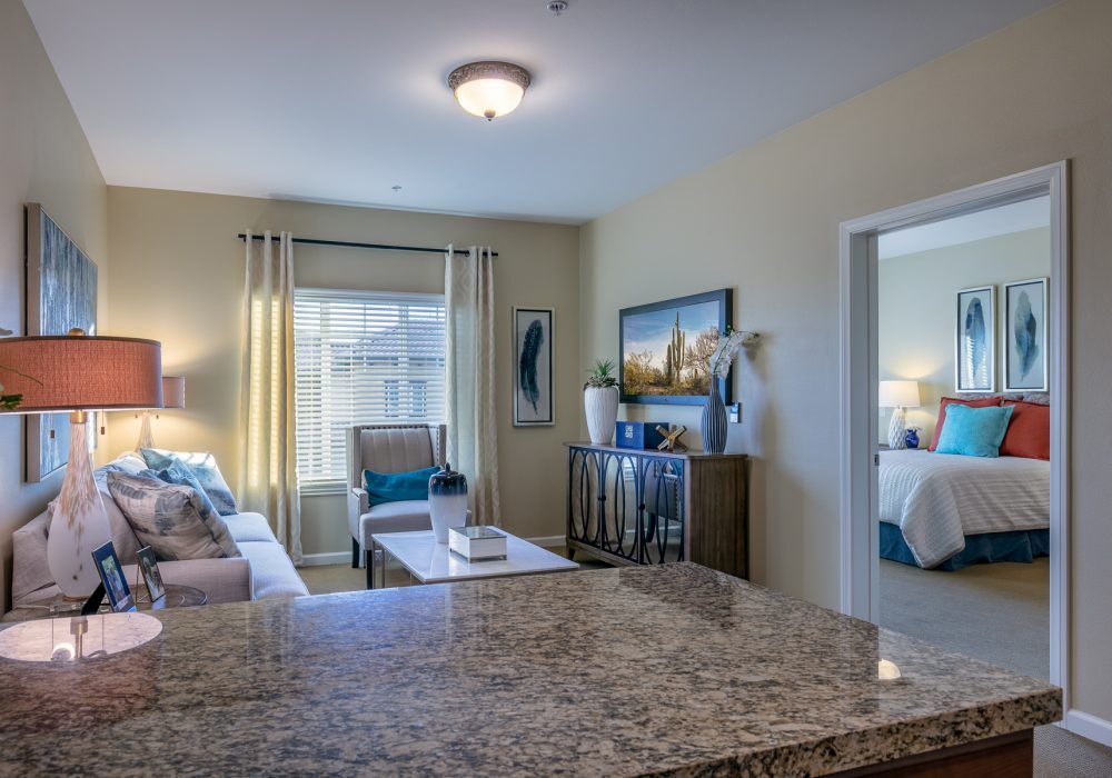 A modern and cozy living room with natural light and stylish decor.
