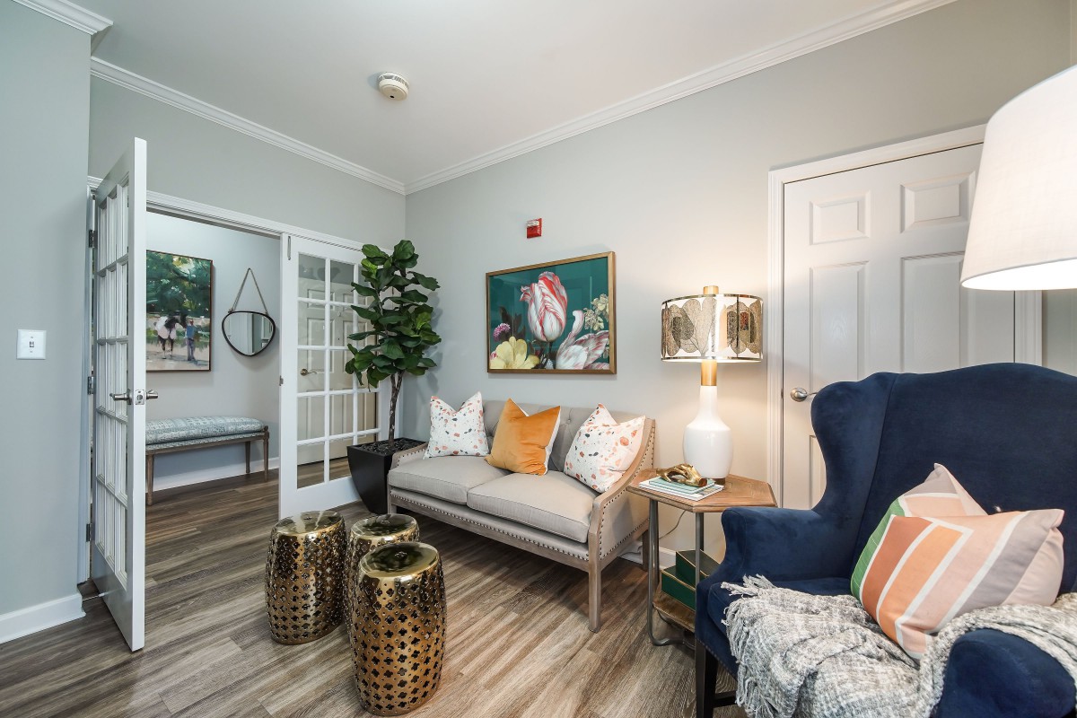 A cozy, modern living room with stylish furniture and decor.