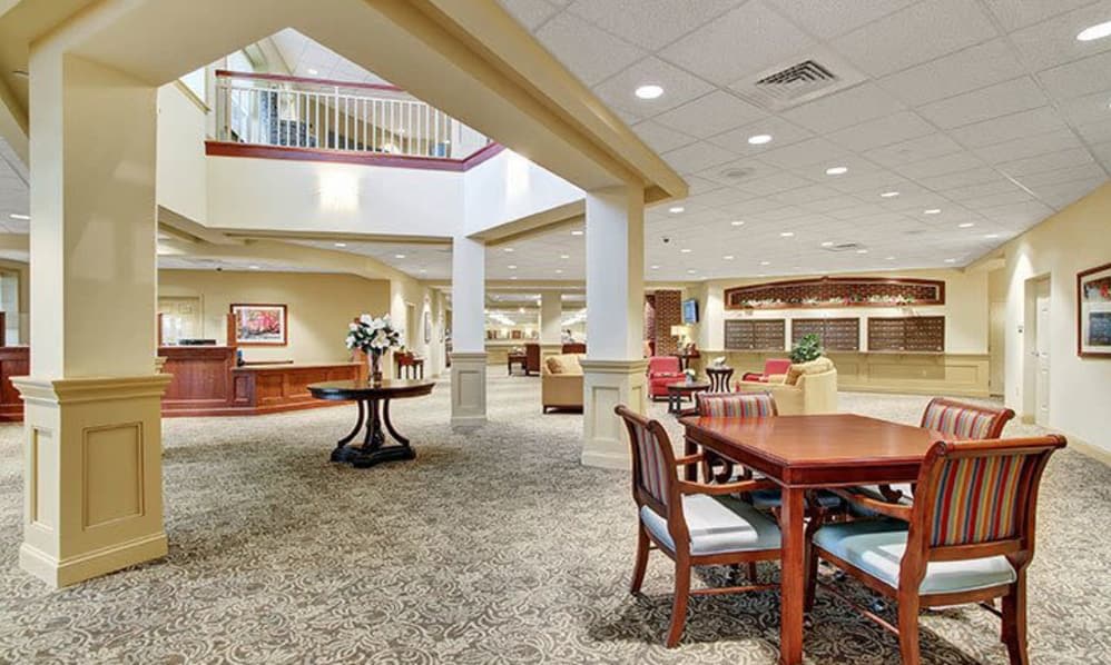 A spacious lobby area with elegant furniture and decor.