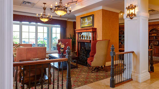 A cozy and inviting lobby with elegant furniture and a warm atmosphere.