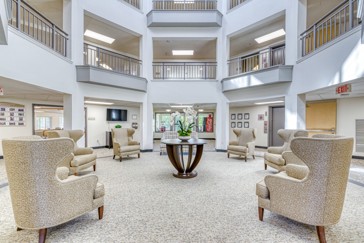 A spacious and modern lobby with comfortable seating and elegant decor.