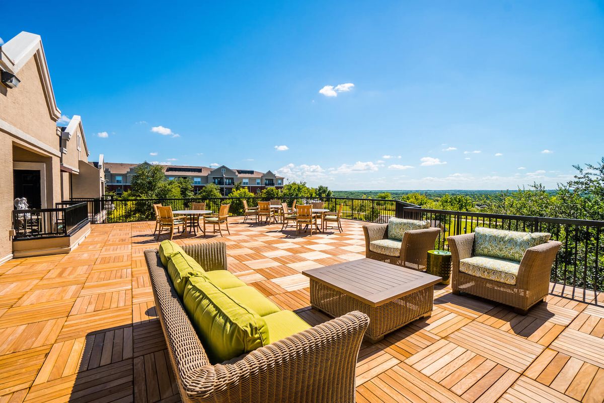 Spacious outdoor terrace with comfortable seating and scenic views.