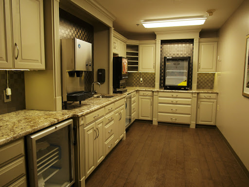 A well-designed modern kitchen featuring stylish cabinetry and appliances.