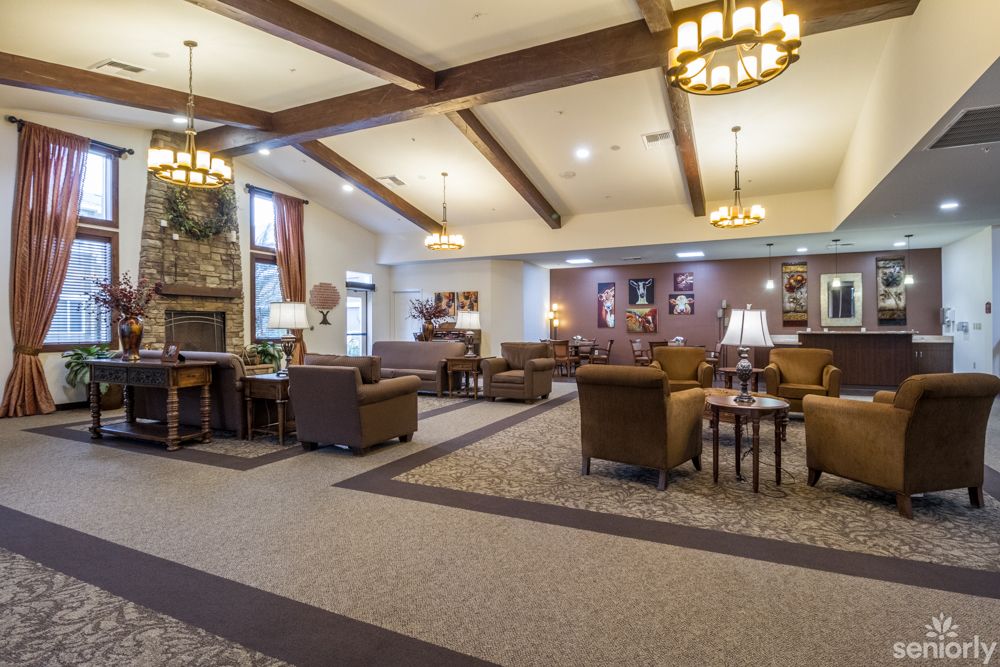 A spacious and cozy lobby with comfortable seating and warm lighting.