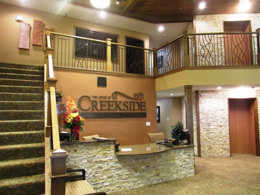 A welcoming lobby of Creekstone Hotel featuring modern design elements.