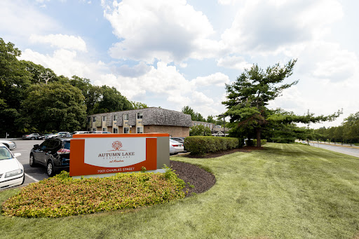 A well-maintained hotel exterior with a prominent signage and landscaped surroundings.