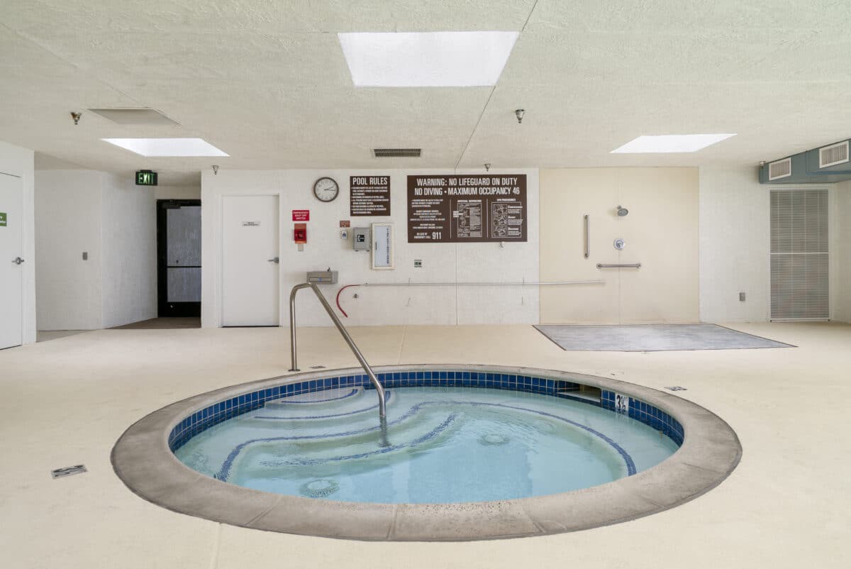 An indoor hot tub in a recreational facility.