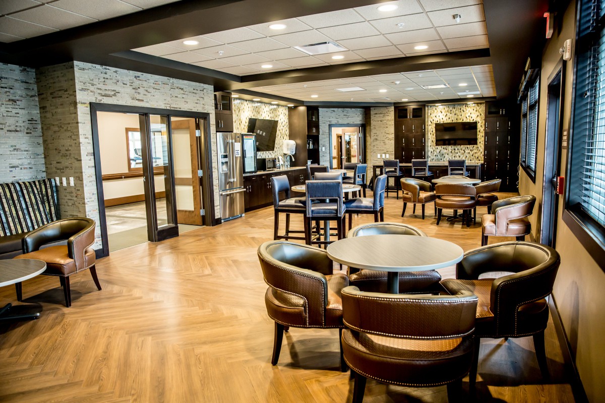 A modern restaurant dining area with stylish decor and comfortable seating.