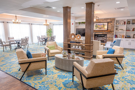 A beautifully designed lounge area featuring comfortable seating and modern decor.
