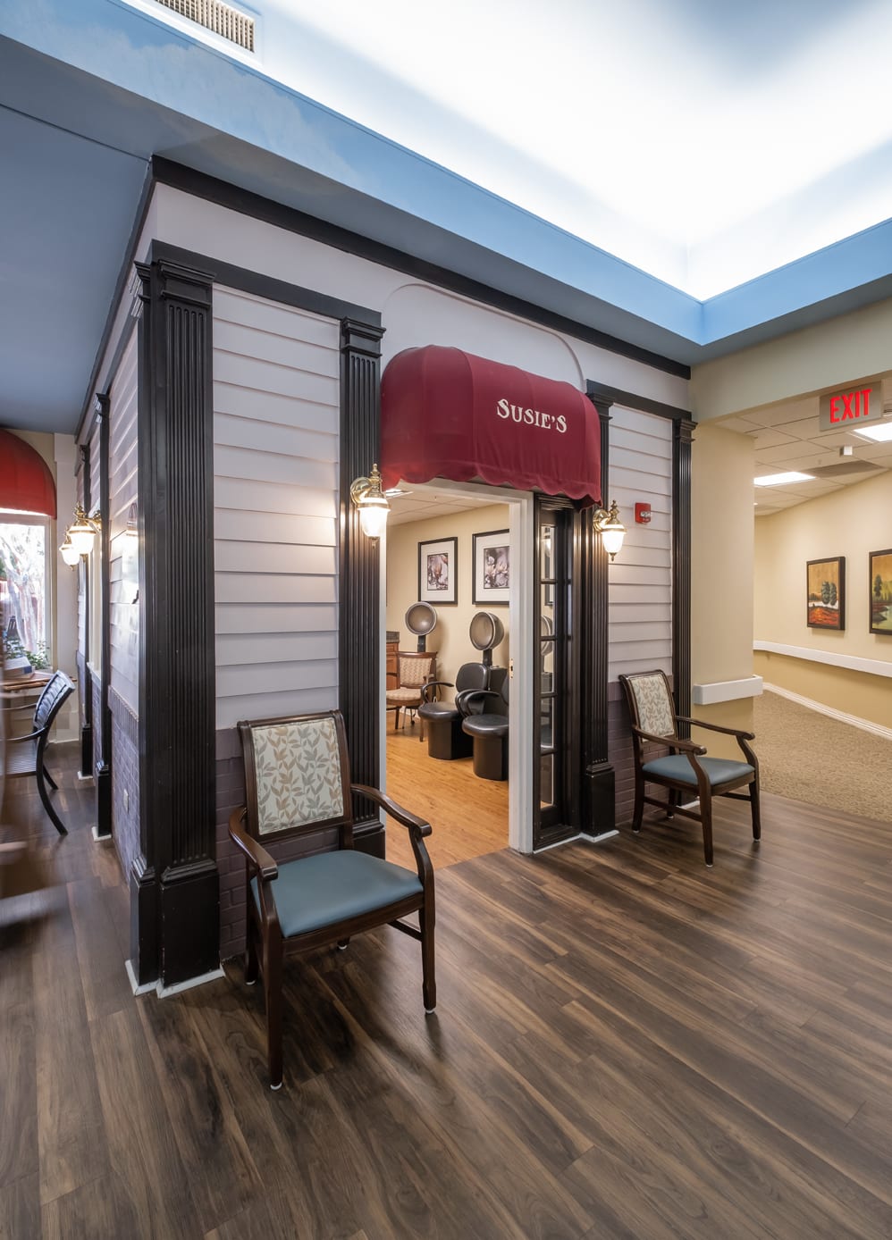 A cozy salon entrance with seating and inviting decor.