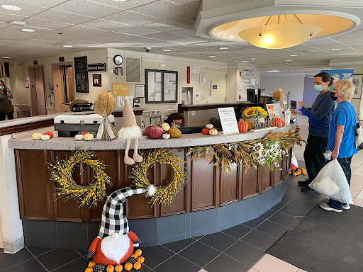 A beautifully decorated reception area showcasing seasonal autumn decor.