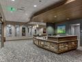Modern reception area with a spacious desk and elegant lighting.