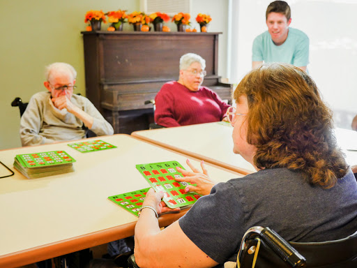 Seniors engage in a lively game of bingo at a community center.