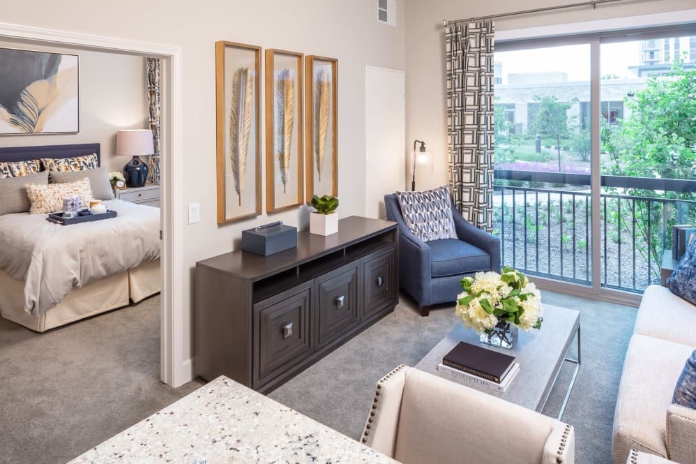 A modern apartment living room with stylish decor and comfortable furniture.