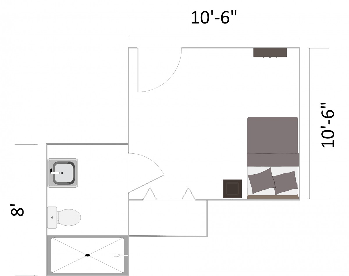 A simple floor plan showing a bedroom with an attached bathroom.
