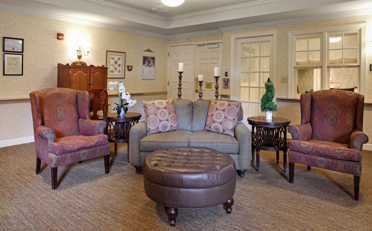 A cozy living room with comfortable seating and elegant decor.