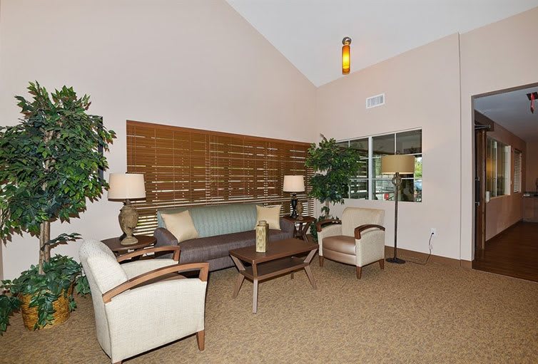 A cozy living room with comfortable seating and stylish decor.
