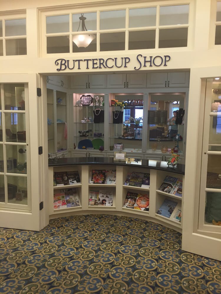 The Buttercup Shop with a charming display window showcasing gifts.