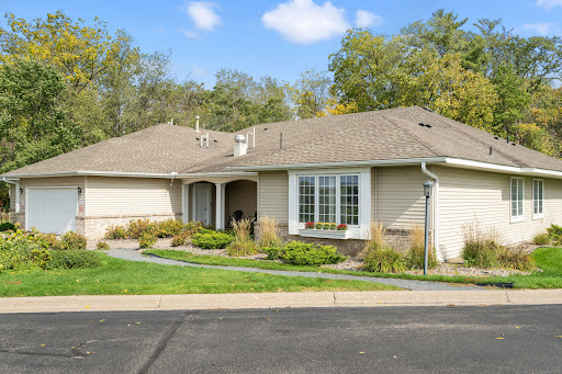 A charming single-story house with a well-maintained front yard and inviting entrance.