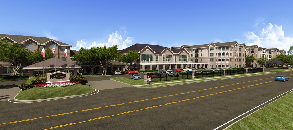 A large residential building with a parking lot and surrounding trees lining the street.