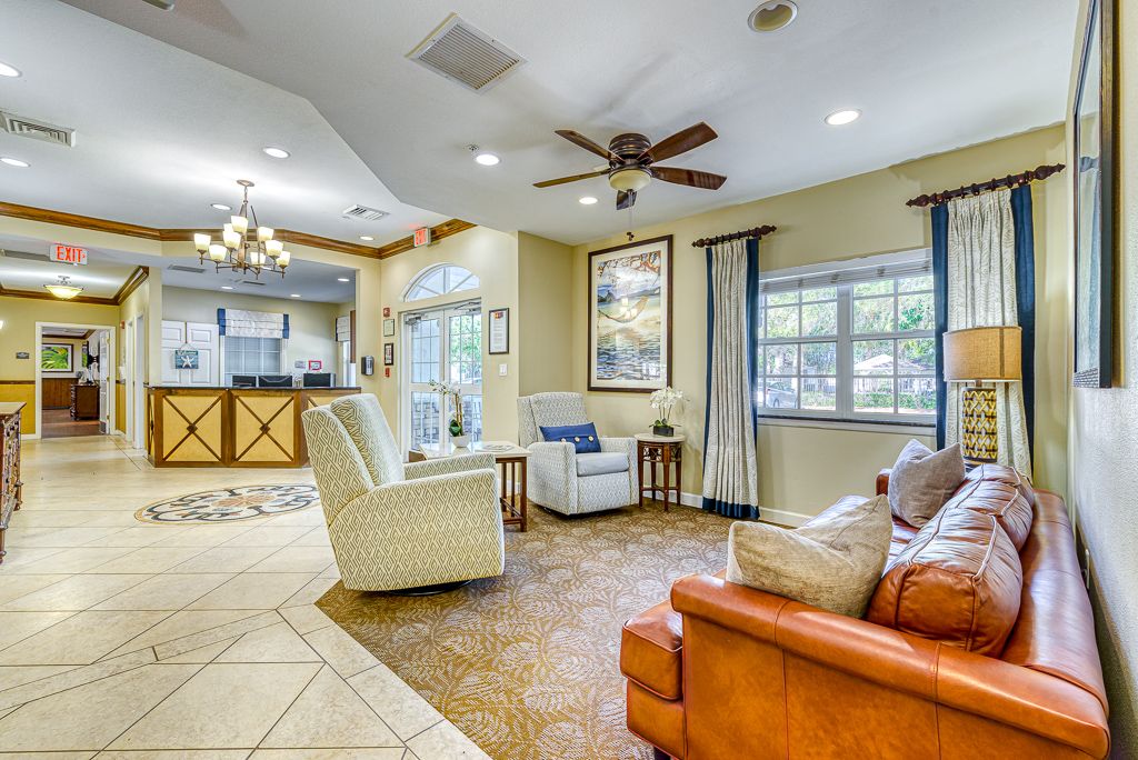 A cozy living room with comfortable seating and natural lighting.