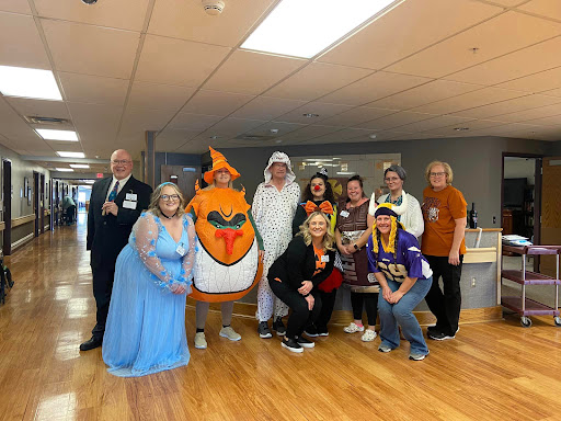 A fun-filled gathering with everyone in creative costumes, showcasing a spirit of celebration.