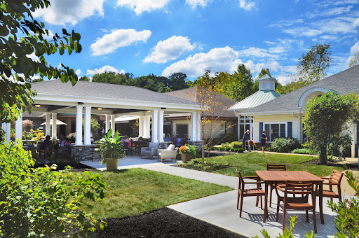 A serene outdoor space featuring landscaped gardens and well-designed architecture.