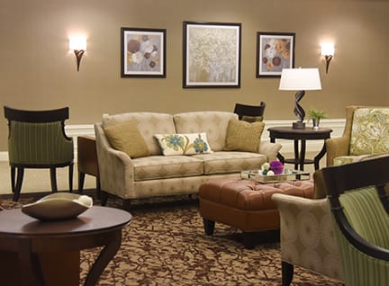 A cozy living room with elegant furniture and tasteful decor.