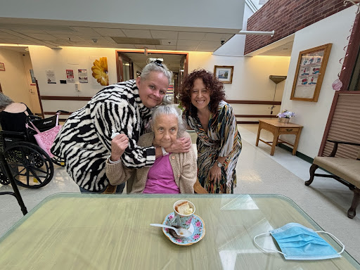 A joyful moment shared between three generations.